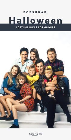 a group of people sitting on top of a white stair case next to each other