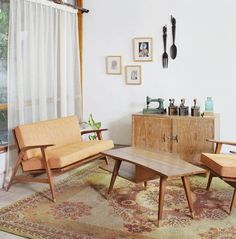 a living room with two chairs and a coffee table