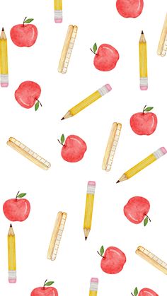 an apple and pencils pattern on a white background