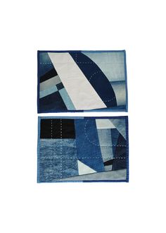 two pieces of blue and white fabric on top of each other