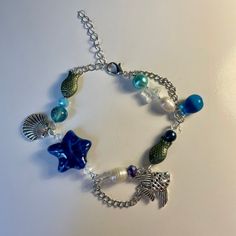 A handmade metkayina ocean themed charm bracelet! So cute and perfect for summer! Ariel Necklace, Shop Till You Drop, Cute Necklace, Jewelry Inspo, Charm Bracelets, So Cute, United Kingdom, Jewelry Bracelets, Etsy Accessories