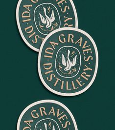 three green and gold stickers with the words florida gravy's on them