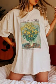 "Looking for the perfect gift for an art or Claude Monet lover? Welcome to Joy of Plants, where we offer a wide selection of unique products inspired by the renowned artist Claude Monet. 🌻 Our Monet Collection includes a variety of items such as Monet art prints on custom canvas totes, ceramic coffee mugs, comfy t-shirts, sweatshirts, hoodies and even personalized journals, wall art and phone cases. Each item features some of the most beautiful and iconic pieces of Monet's artwork, making them Monet T Shirt, Artsy Oversized Graphic T-shirt, Spring Aesthetic Graphic T-shirt, Spring Aesthetic Graphic Print T-shirt, Artsy Oversized Graphic Print T-shirt, Oversized Artsy Graphic Print T-shirt, Oversized Artistic Graphic Print T-shirt, Artistic Oversized T-shirt With Graphic Print, Artsy Relaxed Fit Printed T-shirt