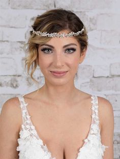 Freshwater Pearl Bridal Headband This simply elegant silver plated pearl headpiece will be a beautiful addition to your wedding day. The flexible headband is hand-wired with glistening Austrian crystals and lustrous freshwater pearls spanning 10" across the silver plated band. Size: Design is 10" across and 1/2" wide. Color: Silver/Light Ivory. Style: 4624hb. Please allow about a week for delivery. Shipping Policy . Return Policy. Crystal Bridal Headband, Pearl Headband Wedding, Bridal Headbands, Pearl Bridal Headband, Pearl Headpiece, Light Ivory, Pearl Bridal, Wedding Accessories Jewelry, Wedding Headband