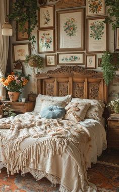 a bedroom with pictures on the wall above the bed, and an old fashioned wooden headboard