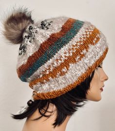 I Designed and Hand Knitted this Slouch, Beanie, Hat, Cap. Fair-Isle Style Hand Knit in multicolors of earth tones and shades. Top of the Hat has a faux fur Pom Pom . Bottom back of the hat has a small tassel with a wood bead. Designed and Hand Knitted in California, USA. See All of My Quality 4 Season Fine Hand Knits listed in My Etsy shop: " Hand Knits 2 Love": Etsy.com/shop/handknits2love Bohemian Hand Knitted Multicolor Beanie, Bohemian Brown Knitted Beanie, Bohemian Multicolor Beanie Cap, Hand-knitted Multicolor Hats For Cold Weather, Slouch Beanie Hats, Bohemian Multicolor Hand-knitted Beanie, Ebay Fashion, Mesh Hat, Slouch Beanie