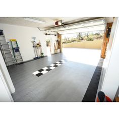 Motordeck Garage Flooring System will transform the look of your space in an afternoon. Give your garage floor added traction and protection with MotorDeck double diamond pattern modular tiles. MotorDeck Color: Alloy, Square Feet: 48 | MotorDeck Diamond 12" x 12" Garage Flooring Tile in Black gray / black in Alloy | 1' L X 1' W | Wayfair G90048ALLY Garage Gym Makeover, Best Garage Floor Paint, Gym Makeover, Small Garage Organization, Car Garage Ideas, Vinyl Garage Flooring, Garage Cabinets Diy, Garage Flooring Options, Glam Office Decor