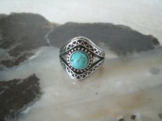 Turquoise Ring This beautiful silver plated ring has a turquoise setting and beautiful engraved design. Size 8. Nickel-free Bohemian Ring, Nickel-free Bohemian Style Ring, Nickel Free Bohemian Ring, Nickel-free Bohemian Ring Jewelry, Silver Southwestern Style Turquoise Ring As Gift, Southwestern Style Silver Turquoise Ring As Gift, Silver Southwestern Turquoise Ring Gift, Southwestern Silver Turquoise Ring Gift, Southwestern Style Silver Turquoise Ring For Gift