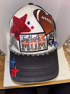 Football Mom themed Trucker Patch Hat. Message me your school colors.  These are the hottest trend on social media today. Great for festivals, concerts, night life and everyday wear. This foam trucker hat is fully adjustable and offered in hat colors Black, White, Light Pink, Neon Pink, Neon Yellow and Green Camouflage. Custom Hats avail. One size fits all. $35 Small Print: patch, mama, cowboy, hat, faith, rock and Roll, trucker, patch, cap, chain, iron on, sew on, festival, concert, neon, baseb One Size Hip Hop Trucker Hat For Baseball Season, Hip Hop Trucker Hat With Letter Print, Hip Hop Trucker Hat With Letter Print Visor, Trendy Trucker Hat For Baseball Season Streetwear, Trendy Trucker Hat For Baseball Season, Sports Fan Trucker Hat For Streetwear, Adjustable Trucker Hat With Letter Print For Fans, Trendy Snapback Trucker Hat For Baseball Season, Trendy Black Trucker Hat For Party