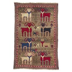 an old rug with various animals on it