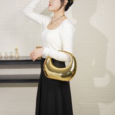 Modern Gold Handheld Shoulder Bag, Modern Gold Shoulder Bag For Office, Gold Clutch With Gold-tone Hardware For Office, Modern Gold Shoulder Bag With Detachable Handle, Modern Gold Bags For Formal Occasion, Modern Shoulder Bag With Chain Strap For Night Out, Chic Gold Shoulder Bag With Detachable Handle, Modern Bags With Gold Chain, Modern Gold Top Handle Shoulder Bag