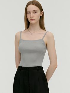 This is MONGDOL’s minimalistic design, the cami sleeveless knit top is versatile and practical. It offers a lightweight feel and a cool, soft touch that allows for comfortable wear without irritating the skin. Made with stretchy ribbed knit fabric, it exudes both comfort and sophistication. The silhouette naturally follows the bodyline, creating a clean and sleek look without any unnecessary bulk. It can be worn alone, as innerwear, or layered for various styling options. The natural neckline and shallow armholes make it suitable for daily wear.- Ideal for daily wear- Can be paired with various styles of bottoms to create different looks- Its basic design makes it easy to match with any outfit Can be used throughout the year as innerwear Gray Seamless Tank Top For Summer, Casual Solid Camisole With Seamless Construction, Seamless Casual Camisole, Casual Solid Seamless Camisole, Trendy Gray Cami Tank Top, Gray Seamless Cami Top, Casual Gray Camisole With Spaghetti Straps, Gray Spaghetti Strap Casual Camisole, Casual Gray Spaghetti Strap Camisole