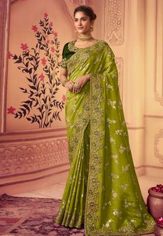 Chinon Saree with blouse in Light green colour 8009  Desc:  Color : Light Green Fabric : Chinon   Georgette Work : Embroidery   Sequence Wash Care : Dry clean Sleeve Style : Half Sleeve Long Sleeves : Done only in Custom Stitch Sleeves Lining : Done only in Custom Stitch Bust Size : 32 to 42 Inches Occasion : Wedding   Festival   Diwali   Mehendi   Sangeet   Engagement   Reception   Ceremonial   Party Wear. With Express Free Shipping and Custom Stitching, Buy Indian Party wedding and bridal Sare Chinon Saree, Green Color Saree, Engagement Saree, Reception Saree, Nauvari Saree, South Silk Sarees, Green Saree, Art Silk Sarees, Trendy Sarees