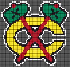 a cross - stitch pattern with scissors and roses on the front, in red, yellow, green and black colors