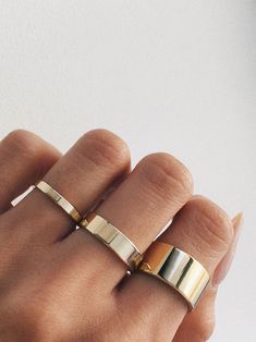 A 10mm minimal band made from sterling silver, bold simplicity - a timeless silhouette. Shop it in our wide and slim silhouettes for the full set. *MEN'S SIZING: We recommend a size 8 for pinky or ring finger The Minimalists, Minimal Flat, Girl Jewelry, Jewelry Inspo, Cute Jewelry, Jewelry Branding, Gold Bands, Ring Verlobung, Ring Designs