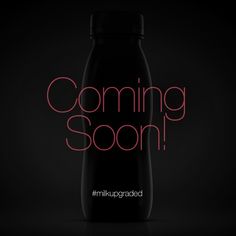 a black bottle with the words coming soon on it