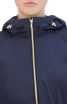 Long commutes and travels abroad are a breeze in an entirely packable rain jacket topped with a protective hood and shaped with a nipped-in drawcord waist. 29" length Front zip closure Drawcord-toggle hood Front snap-welt pockets Drawcord-toggle waist 95% polyester, 5% nylon Machine wash, line dry Imported Solid Weatherproof Windbreaker For Travel, Weatherproof Hooded Raincoat For Travel, Hooded Weatherproof Raincoat For Travel, Functional Hooded Raincoat For Travel, Sporty Raincoat With Detachable Hood For Travel, Travel Weatherproof Windbreaker, Solid Color Windproof Outerwear For Travel, Nylon Raincoat For Travel During Rainy Season, Windproof Outerwear For Travel