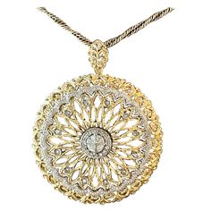 Lovely 18 K yellow and white Gold open work filigree pendant and chain. Set with tiny brilliant cut Diamonds. Finished with milgrain edges. The length of the chain is 41.5 cm. Total weight 22.56 grams. Dimension of pendant: width 3.90 cm and height 4.80 cm. QUESTIONS? Contact us right away if you have additional questions. We are here to connect you with beautiful and affordable antique and estate jewelry. Masterfully handcrafted piece! Authenticity and money back is guaranteed. For any enquires Elegant Round Engraved Diamond Necklace, Exquisite Diamond Necklace With Intricate Design, Luxury Necklaces With Intricate Medallion Design, Classic Necklace With Intricate Round Pendant, Luxury Oval Necklace With Intricate Design, Exquisite White Gold Diamond Necklace With Intricate Design, Intricate Round Diamond Necklace, Gold Diamond Necklace With Intricate Design For Anniversary, Classic Necklaces With Intricate Round Pendant