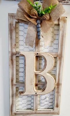 the letter b is made from an old window frame