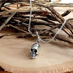 Solid 925 Sterling Silver TINY 15mm Human Skull Charm paired with a well made .8mm Italian 925 Sterling Silver Cable or Box Chain.  Necklace Gift Box Included.  Click on Link below to Shop our Etsy Store: https://www.etsy.com/shop/LastingMemoryJewelry Disclaimer: Items may appear larger in close-up photos, as to show details. Please read the listing carefully and go by size stated in listi Minimalist Witch, Necklace Gift Box, Halloween Tattoo, Punk Jewelry, Human Skull, Witch Halloween, Skull Jewelry, Small Charms, Skull Pendant