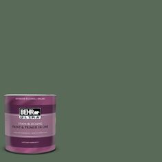 a can of behro ultra stain - blocking paint on a dark blue background