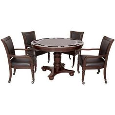 a dining table with four chairs and a poker chip on the top, all in dark brown leather