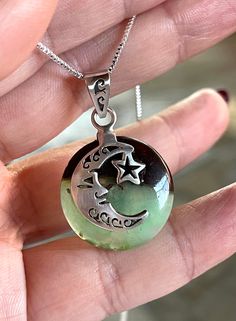 "Natural, untreated, raw(polished surface), Chrysoprase celestial pendant necklace set in oxidized 925 sterling silver setting, with 22\" inches long chain (not oxidized), alligator clasp closure. Pendant included bail: 1.40\" x 0.90\" inches. Stone: 22mm, Round." Silver Jade Crystal Necklace For Gift, Green Spiritual Jewelry With Natural Inclusions, Spiritual Green Jewelry With Natural Inclusions, Green Moon Charm Round Necklace, Green Moon Charm Necklace, Green Necklace With Moon Charm, Green Moonstone Jewelry For Healing, Green Moonstone Jewelry Gift, Spiritual Green Crystal Round Pendant Necklace