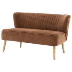 a brown couch sitting on top of a wooden frame