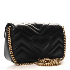 This is an authentic GUCCI Calfskin Matelasse Super Mini GG Marmont Shoulder Bag in Black. This shoulder bag is crafted of smooth calfskin leather in black. This bag features an optional aged gold chain shoulder strap and an aged gold GG logo on the front. The flap opens to a beige fabric interior. Gg Logo, Gg Marmont, Beige Fabric, Shoulder Bag Black, Gold Chain, Gold Chains, Calf Skin, Shoulder Strap, Gucci