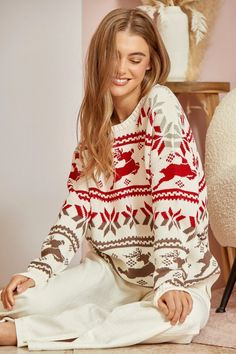 Description Make a festive statement with the On Dasher, On Prancer Ivory Sweater! The perfect blend of style and holiday spirit, this ivory sweater is decorated with reindeer graphics and features ribbed sleeve and bottom details. Dress it up or down for any Christmas festivities! Specs Self: 60% Cotton | 40% Acrylic Unlined Hand wash cold Do Not Bleach Hang Or Line dry Fits true to size - model is wearing a small S (0-4), M (6-8), L (10-12) SKU#: IS-003323 Please note that all online inventory reflects inventory in store. White Holiday Sweater, White Long Sleeve Nordic Top, White Nordic Winter Tops, White Knit Christmas Sweater, Cozy White Holiday Sweater, Cozy White Sweater For Holidays, Lotion Candles, Christmas Festivities, Flat Hair