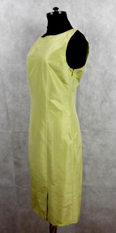 Elegant dress by Etro, sleeveless plain model with small slits in the front and rear, zip to the left,in pale green color, full lining. Made of 76% cotton, 24% silk, lining - 100% silk, made in Italy, size 42 Very well preserved Measurements taken flat: Length 99 cm / 39'' Shoulder width 35 cm / 13.7'' Waist 39 cm / 15.4'' Hips 47 cm / 18.5'' Fitted Sleeveless Light Green Dress, Spring Sleeveless Knee-length Dress With Back Zipper, Sleeveless Dress With Side Zipper For Spring, Sleeveless Dresses With Side Zipper For Spring, Light Green Fitted Sleeveless Dress, Fitted Light Green Sleeveless Dress, Fitted Green Dress With Side Zipper, Elegant Sleeveless Light Green Dress, Spring Formal Sleeveless Dress With Back Zipper