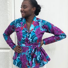 African Ankara Print Women Veroex Handmade Peplum Long Sleeve Top Blazer Made With Cotton Fabric Model Is Wearing Size 8 Contact Me For Any Questions About The Dress Fitted Purple Floral Print Top, Purple Cotton V-neck Blouse, Fitted Purple Chic Blouse, Chic Fitted Purple Blouse, Fitted Lavender V-neck Blouse, Fitted Long Sleeve Purple Blouse, Fitted Purple Long Sleeve Blouse, Fitted Purple Floral Print Blouse, Chic Purple Cotton Blouse