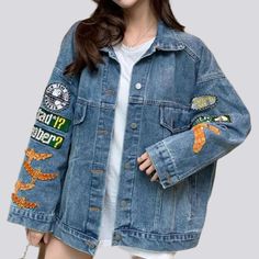 Indulge in luxury and trend with our 2023 Spring-Summer Collection's Vintage Back Print Denim Jacket! This oversized, y2k-style jacket is the perfect mix of modern fashion modes and timeless denim charm. With its intricate buttoned closure and artfully printed back, this jacket is not just a fashion statement, but a symbol of elegance and grandeur.Distinctive Features: Y2K Styling: The oversized, boxy shape of this jacket perfectly captures the essence of the iconic y2k fashion era. Artfully Pai Trendy Relaxed Fit Denim Jacket With Long Sleeves, Oversized Long Sleeve Denim Jacket With Patches, Trendy Long Sleeve Denim Jacket With Patches, Trendy Patched Denim Jacket, Trendy Cotton Denim Jacket With Patches, Trendy Denim Jacket With Patches, Oversized Casual Outerwear With Patches, Casual Oversized Outerwear With Patches, Spring Cotton Denim Jacket With Graphic Print