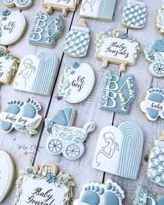 baby shower cookies are laid out on a table