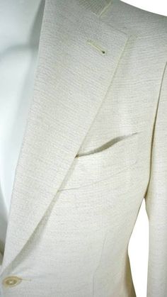 Latte Lino Tweed Jacket Elegant Beige Tweed Jacket With Welt Pockets, Formal Beige Tweed Jacket With Hidden Buttons, Beige Tweed Jacket With Lapel Collar For Formal Occasions, Elegant Beige Tweed Jacket With Notch Lapel, Elegant Beige Tweed Jacket With Lapel Collar, Elegant Beige Tweed Jacket With Suit Collar, Formal Cream Tweed Jacket, Beige Tweed Jacket With Notch Lapel For Office, Notch Lapel Beige Tweed Jacket For Office