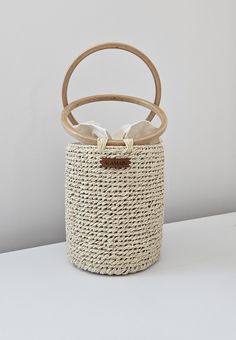 100% handmade Inner lining is satin Pouch available (linen) Height: 17cm Width: 14cm Natural Basket-shaped Bucket Bag With Detachable Handle, Beige Basket-shaped Natural Fiber Bag, Beige Rattan Basket-shaped Bucket Bag, Satin Pouch, Luxury Handwoven Basket-shaped Bag, Brown Handwoven Basket-shaped Bucket Bag, Top Handle Bags, Basket Bag, Top Handle