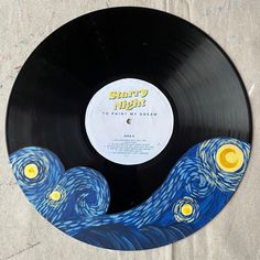 a vinyl record with the starry night painting on it