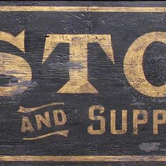 an old wooden sign with the words stop and supply written in gold paint on it