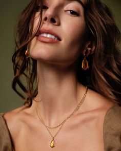 Thoughtfully designed for your styling needs, the Camry Gold Enamel Frame Multi Strand Necklace in Marbled Amber Illusion takes the guesswork out of necklace layering. A kite-shaped stone with a hand-painted enamel frame takes the spotlight in this duo, with a complementary chain adding just enough dimension. As timeless as it is fashion forward, this multi strand is bound to be part of your regular rotation. Metal 14k Yellow Gold Over Brass Material Marbled Amber Illusion Closure Lobster Clasp Elegant Layered Necklace For Jewelry Making, Delicate Teardrop Pendant Chain For Layering, Layered Gold-plated Necklace For Gifts, Layered Gold Plated Necklaces As Gift, Layered Gold Plated Necklaces For Gifts, Layered Gold Plated Necklace For Gift, Layered Gold Plated Jewelry As Gift, Everyday Layered Jewelry, Gold Teardrop Pendant Necklace For Layering