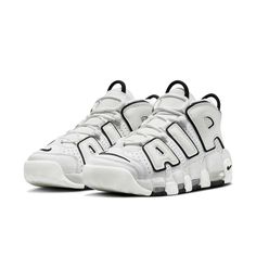 The Nike Air More Uptempo ‘White Black’ is a beautifully simplistic take on a ‘90s classic. This mid-top hoops shoe was made famous by Scottie Pippen and it does not disappoint with its clean white perforated leather upper and oversized ‘AIR’ lettering in black. The perfect finishing touch is provided by the black accents on the embroidered Swoosh atop the toe, the jewel Swoosh at the heel, and the dual pull loops that make this shoe easy to slip on and off. It’s all set atop a Phylon midsole with visible Air-sole cushioning. Nike Air Traîner, Nike Air More Uptempo Femme, Nike Size Chart Shoes, Unpopular Nike Shoes, Shoes That Arent Nike, Air Written Shoes, Most Trendy Nike Shoes, Nike Sinza, White And Black Nike Shoes Women