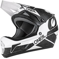 the oneal helmet is designed to look like it has been painted with black and white designs