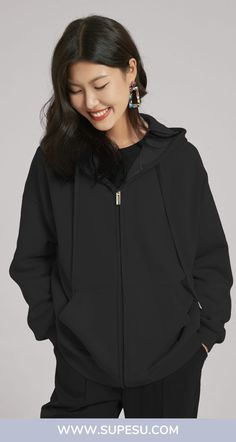 oversized black hoodie for women with front zipper and pockets Oversized Black Hoodie For Loungewear, Oversized Cozy Black Hoodie, Cozy Oversized Hoodie With Kangaroo Pocket, Oversized Black Hoodie With Kangaroo Pocket, Black Relaxed Fit Soft-washed Hoodie