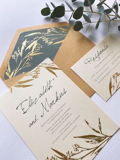 wedding stationery with gold foil and greenery