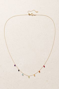 After working with skilled artisans in Tokyo, Persée founder Nawal Laoui discovered the 'pierced' diamond technique - it creates the illusion of stones floating on top of your skin. This 18-karat gold necklace is strung with stones in a variety of colors to represent the 'Seven Chakras'. Wear it on days you need balance. Luxury Drop Multi-stone Jewelry, Fine Jewelry In 14k Gold With Stones, Diamond Drop Necklace With Gemstone, Fine Jewelry Gemstone Drop Necklaces, Fine Jewelry Drop Gemstone Necklaces, Fine Jewelry Drop Gemstone Necklace, Fine Jewelry Diamond Multi-stone Necklace, Diamond Multi-stone Necklace In Fine Jewelry Style, Sterling Silver Briolette Diamond Necklace