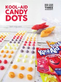 an advertisement for kool aid candy dots on a table with candies and other snacks