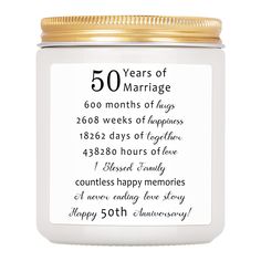 a white jar filled with 50th anniversary messages on it's front and back sides