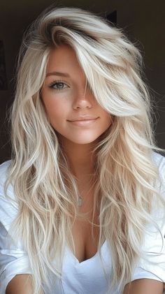 Blonde Shag Haircuts: 18 Trendy Ideas to Refresh Your Look Long Layered Hair With Long Bangs, Blonde Shag Hairstyles, Platinum Blonde Shag, Blonde Shag, Hair Color Swatches, Shag Cut, Long Shag Haircut, Long Hair Ponytail, Haircuts For Medium Length Hair