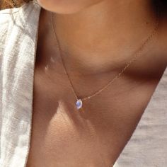 Our Faceted Moonstone Necklace is magical in every way. The delicate solid gold chain perfectly complements the marquise cut moonstone, radiating clarity and high vibrations with flashes of mesmerizing blue. Moonstone's feminine energy makes this necklace perfect for any goddess or those seeking a touch of celestial energy. DETAILSAvailable in 14k Solid GoldAvailable in 14", 16", and 18"Hypoallergenic, Nickel-Free, and Water Safe Celestial Energy, High Vibrations, Jewelry Details, Solid Gold Chains, Forever Jewelry, Leather Box, Moonstone Necklace, Solid Gold Jewelry, Marquise Cut