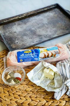 the ingredients for this meal are laid out on a tray and ready to be put into the oven