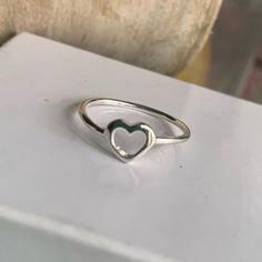 New Sterling Silver Heart Ring Size 5. Stamped 925 Sterling Silver On Band. Not Plated. Does Not Tarnish. Same Day Shipping From North Carolina. Sterling Silver Open Heart Ring, Valentine's Day 925 Silver Open Heart Ring, White Gold Diamond Band, Pandora Rose Gold, Gold Diamond Band, Silver Heart Ring, Feather Ring, 5 Rings, Luxury Diamonds